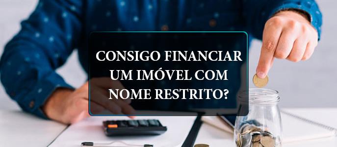 Consigo financiar um imóvel se meu nome estiver com restrição ao crédito?